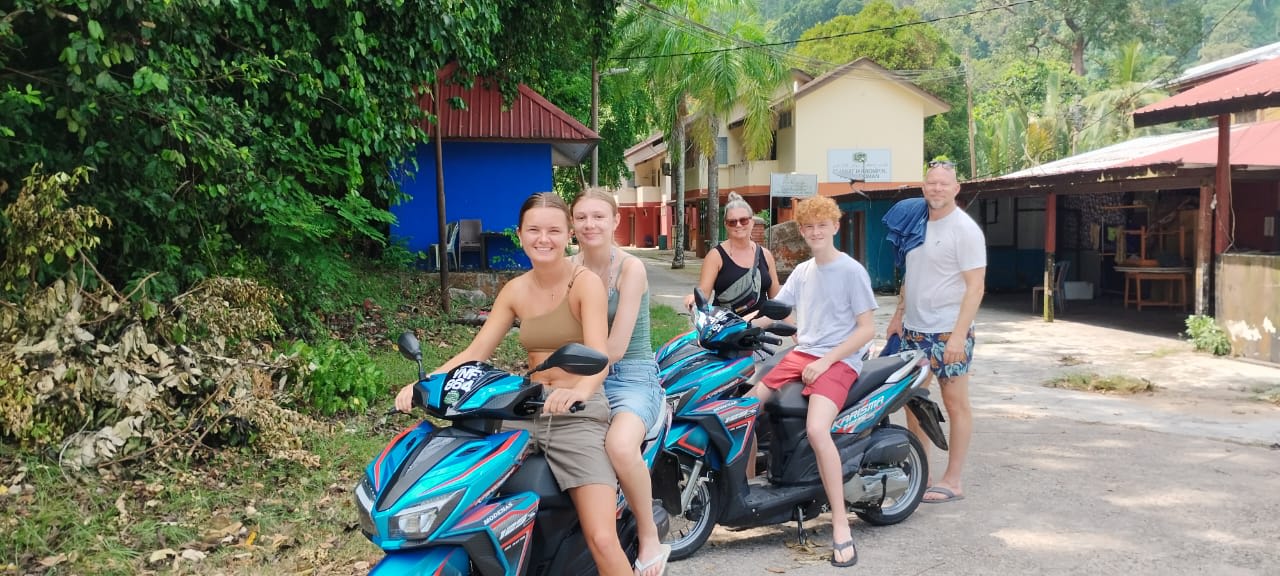 Blue Tio motorbike rental shop front near Berjaya and Tekek Tioman Island