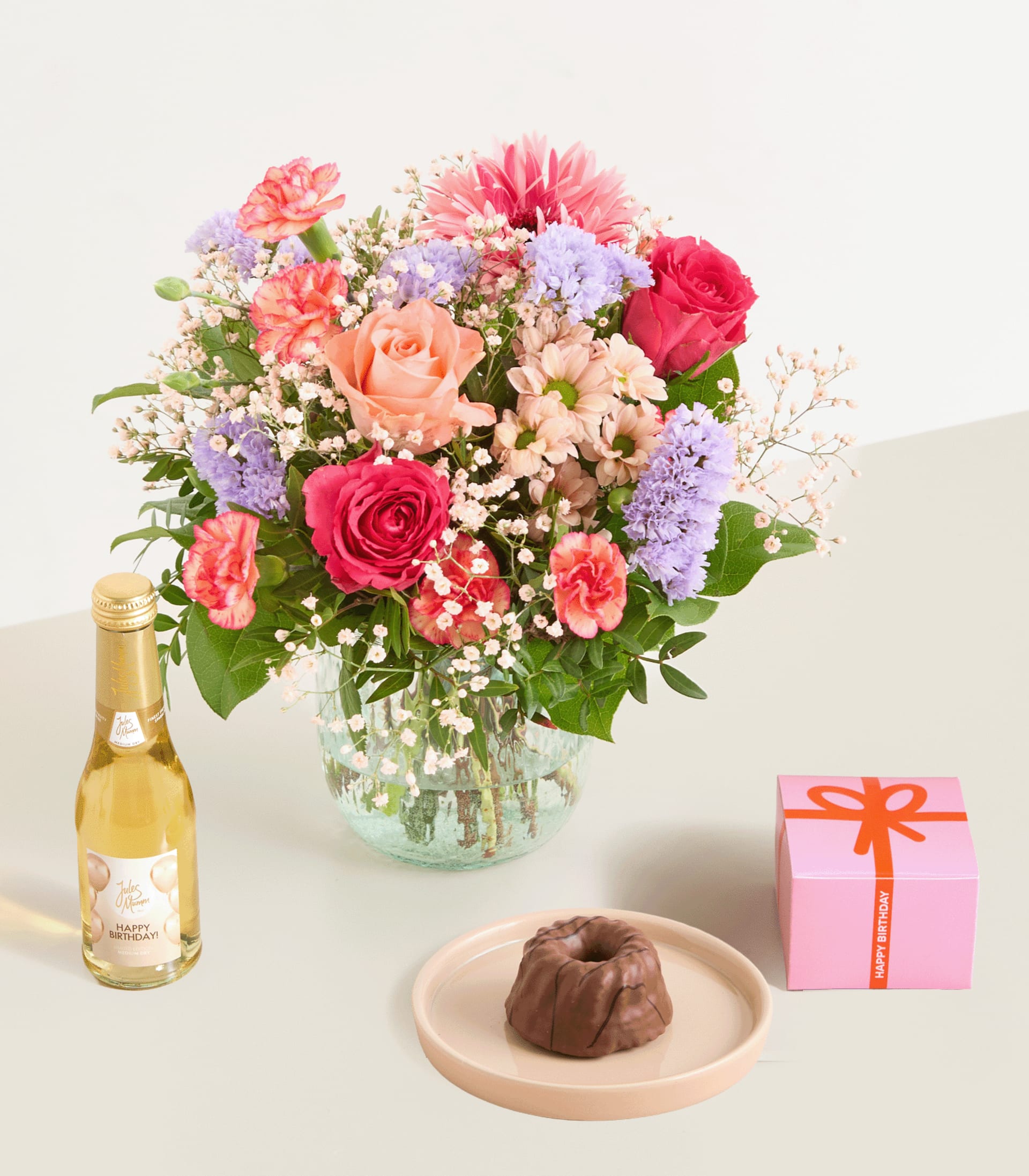 Frühling mit Geburtstagsküchlein und Sekt