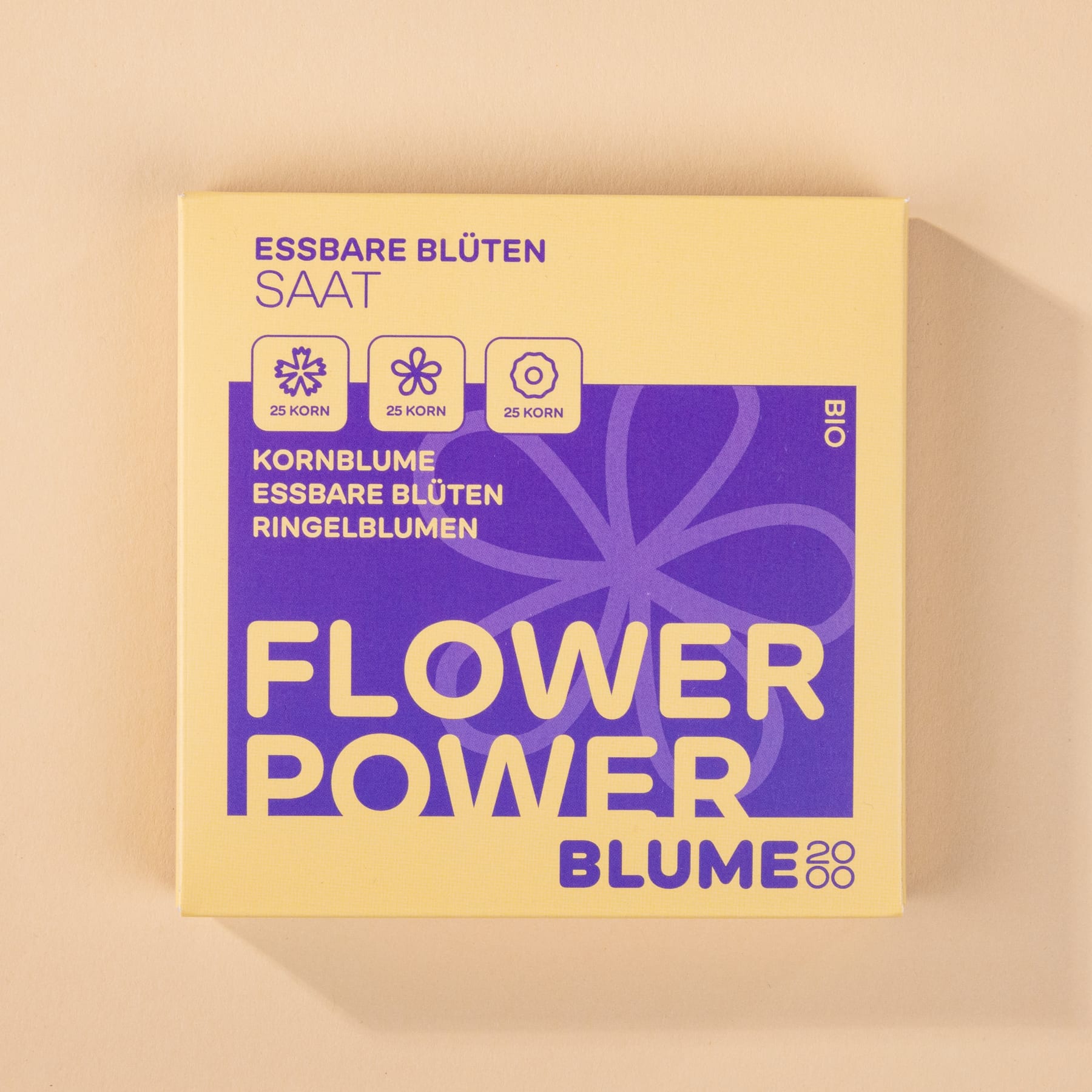 Vor einem hellpfirsichfarbenen Hintergrund wird eine gelbe Box mit dem Text „FLOWER POWER BLUME“ und verschiedenen Blumensymbolen angezeigt.