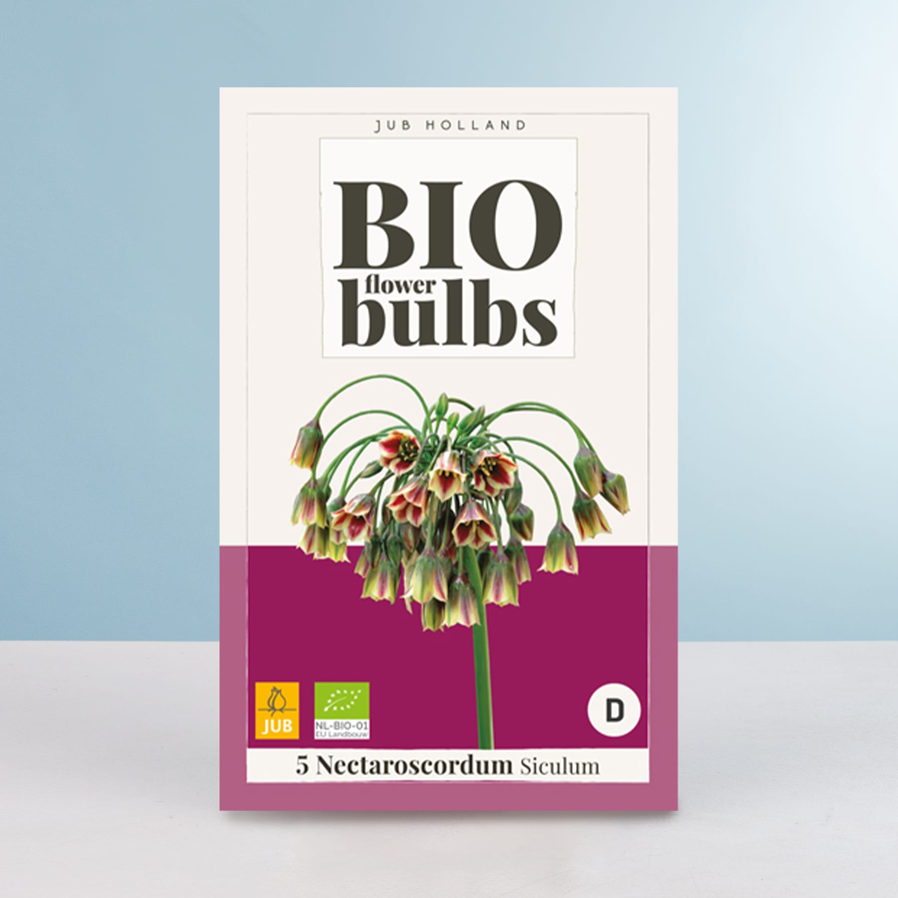 Das Bild zeigt eine Packung Bio-Blumenzwiebeln mit leuchtend grünen und rosa Blüten vor hellblauem Hintergrund.