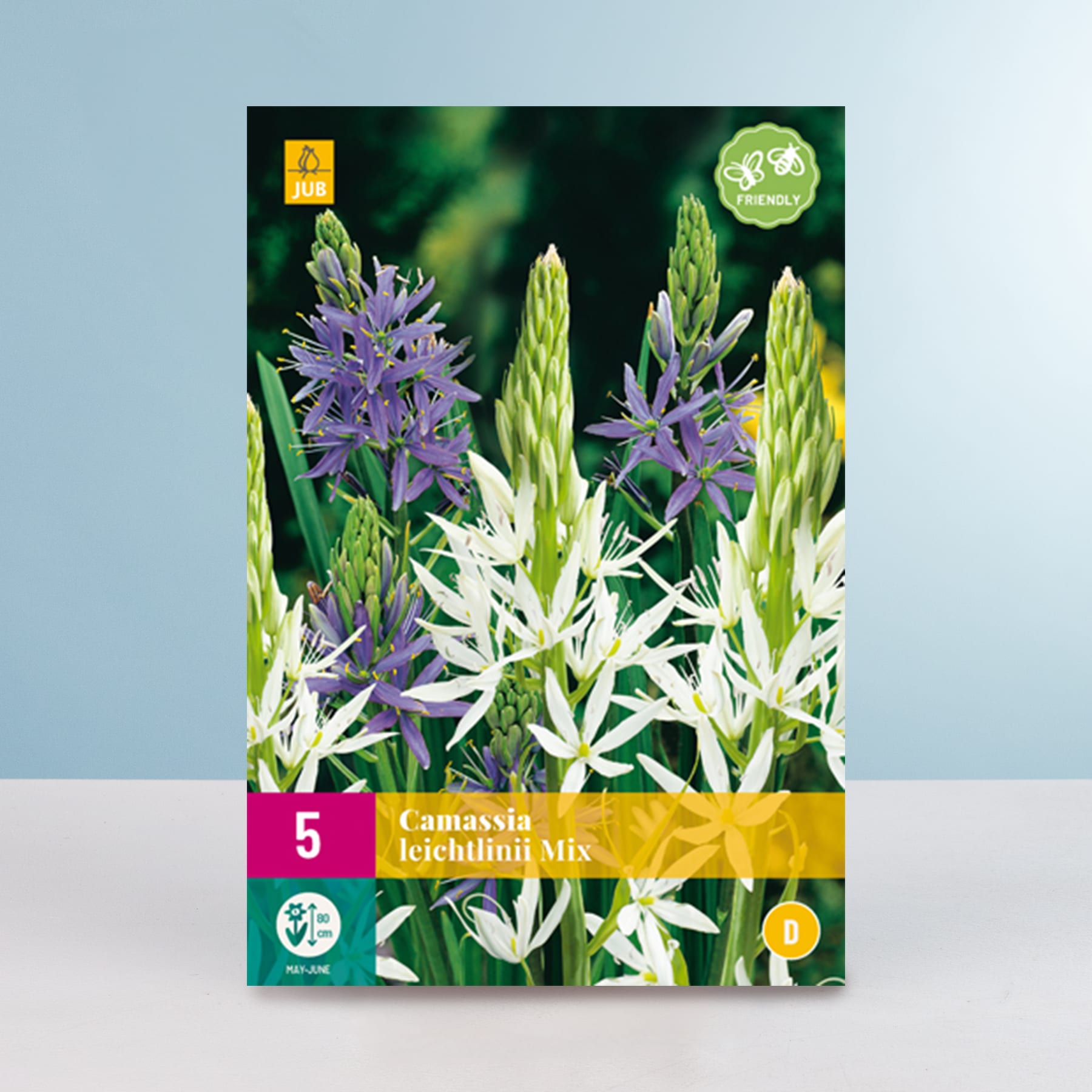 Das Bild zeigt eine leuchtende Palette violetter und weißer Blüten vor einem verschwommenen grünen Hintergrund. Auf dem Etikett ist angegeben, dass es sich bei dem Produkt um einen „Camassia Leichtlinii Mix“ handelt.