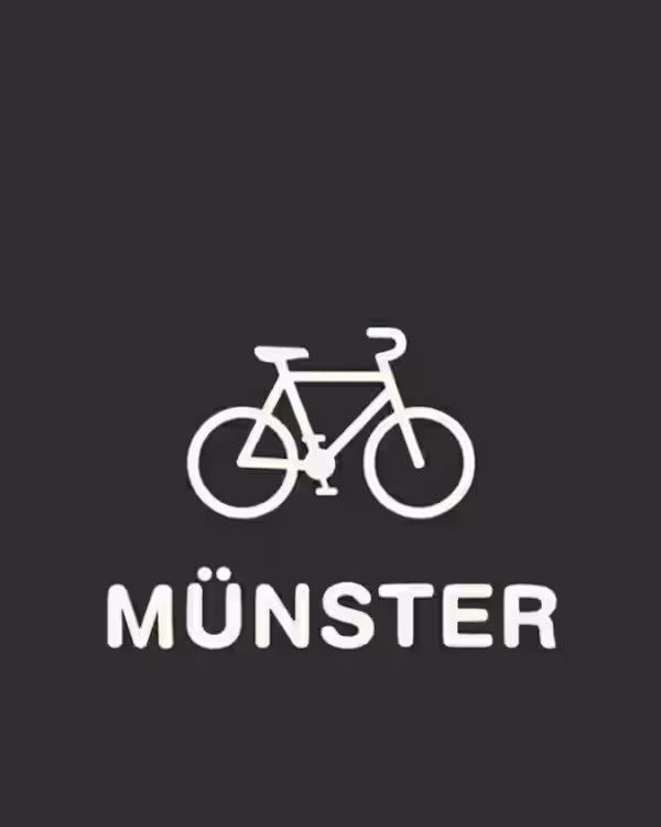 Auf dunklem Hintergrund sind ein weißes Fahrradsymbol und der Schriftzug „MÜNSTER“ abgebildet. (Beschreibungstext KI-generiert)