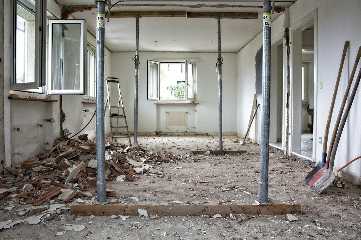 Water damage restoration professional working