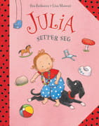 Julia setter seg