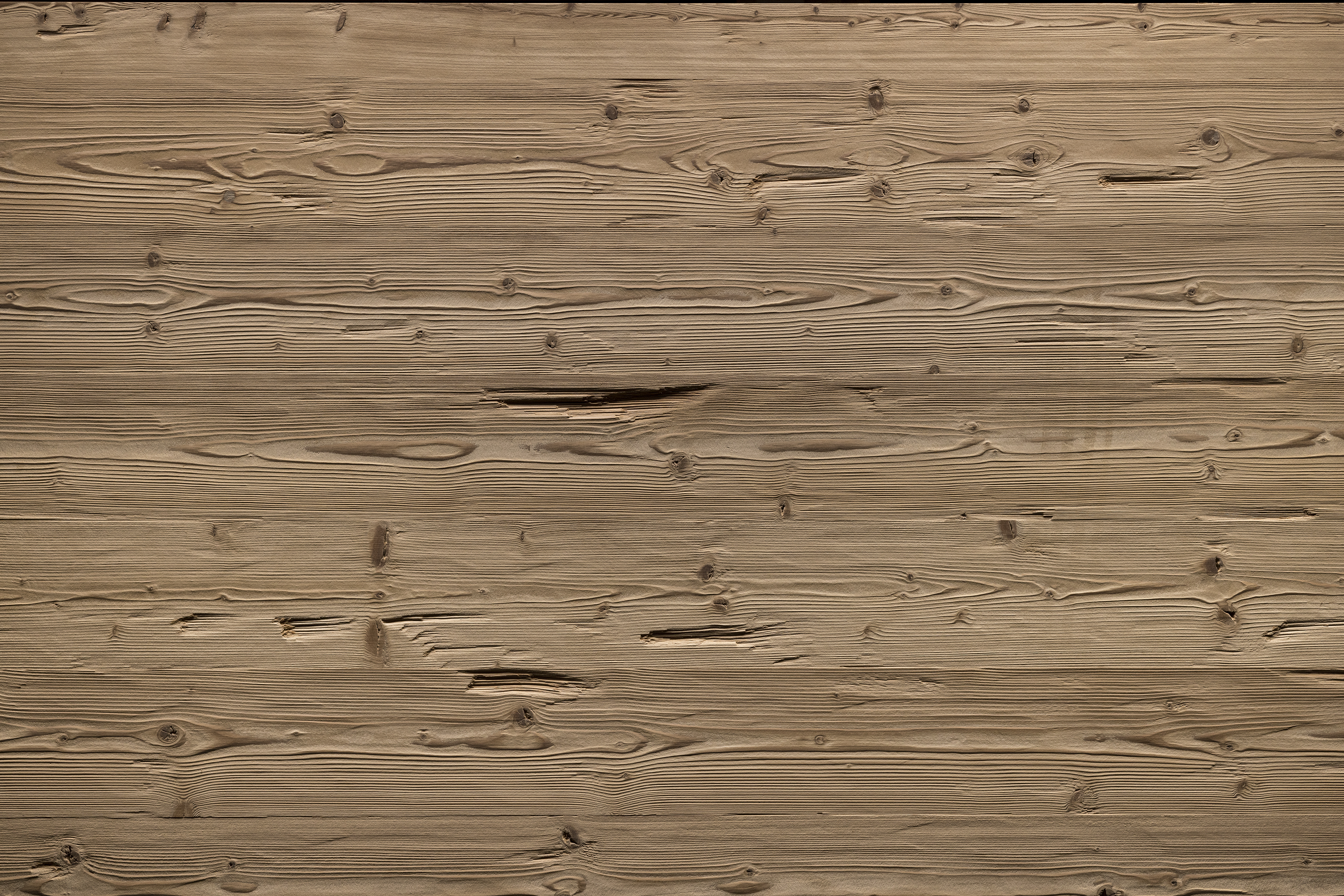 Les lambris (panneaux muraux et de plafond) de X-Wood sont synonymes d'une finition haut de gamme du bois et d'un concept de design qui intègre des matériaux naturels dans l'architecture moderne. Les panneaux portent souvent le nom de sommets de montagne célèbres (tels que le Cervin, l'Eiger ou la Marmolada). Techniques de finition : X-Wood utilise des procédés traditionnels et innovants tels que le hachage, le brossage, le brûlage (flamage), la vaporisation ou les traitements thermiques (jusqu'à 215 °C) pour créer des textures et des nuances de couleurs uniques.