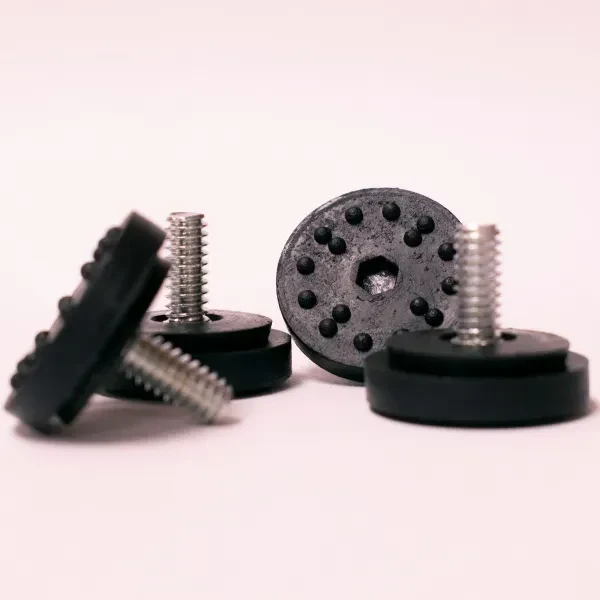 Close-up of a single Modesto table base glide with 1/4 inch thread