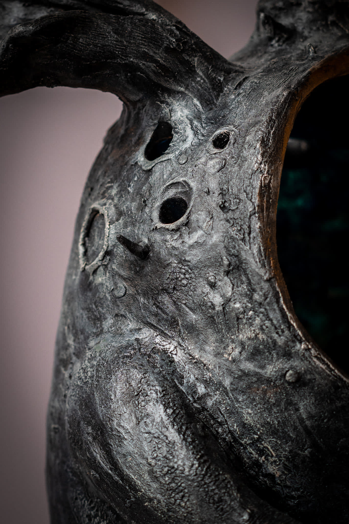 Horned ceramic vessel, close view of the pierced shell