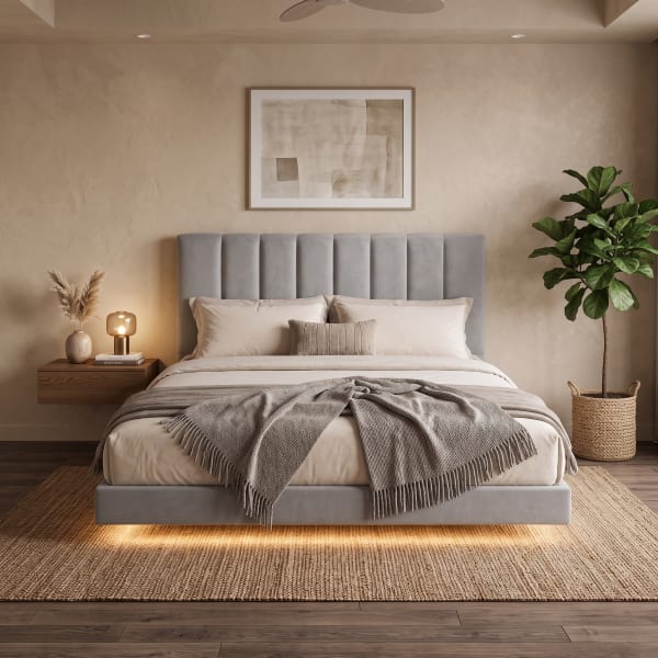 Beige bed with tufted headboard and matching dresser.