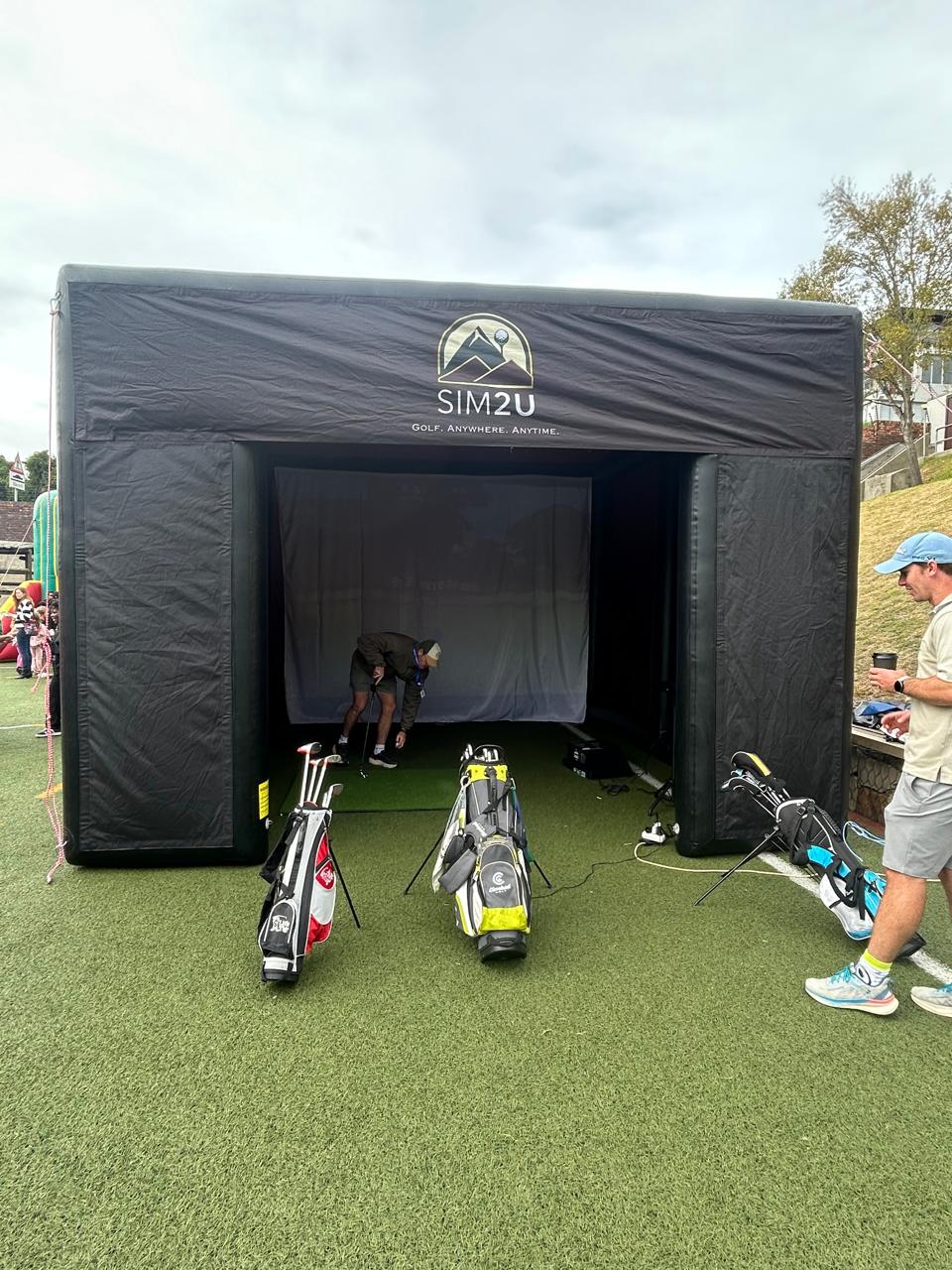 Sim2U golf simulator at a birthday parties event