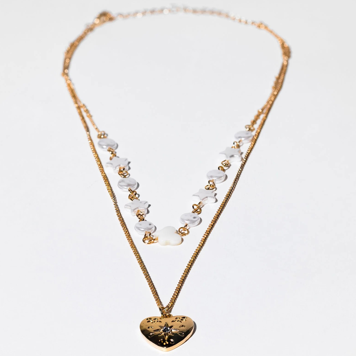 Charming Charlie Gold Heart Necklace. 2 Piece