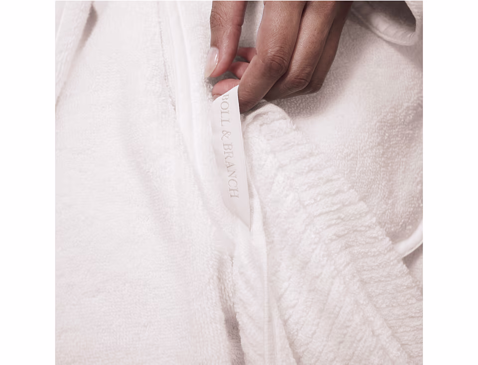 Detail close up of the Spa Bath Towel and hanging loop in White