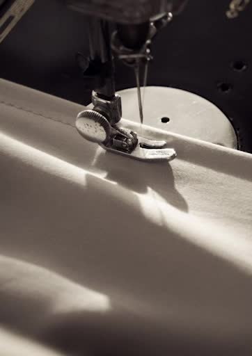 video background image - Sewing machine sewing sheets