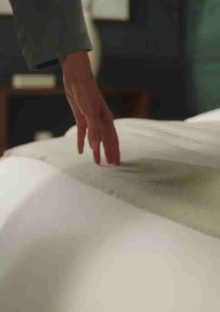 video background image - Hands brushing over throw