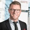 En profilbild av fastighetsmäklare Martin Bergman