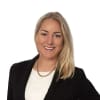 En profilbild av fastighetsmäklare Mikaela Bogestedt