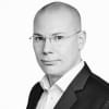 En profilbild av fastighetsmäklare Anders Lundgren