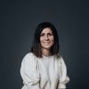 En profilbild av fastighetsmäklare Angela Eriksson