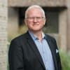 En profilbild av fastighetsmäklare Richard Rosvall