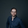 En profilbild av fastighetsmäklare Johan Karlsson