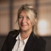 En profilbild av fastighetsmäklare Anette Blomstedt