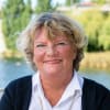 En profilbild av fastighetsmäklare Annika Thustrup
