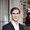 En profilbild av fastighetsmäklare Lukas Landberg