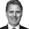 En profilbild av fastighetsmäklare Johan Slättberg