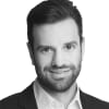 En profilbild av fastighetsmäklare Pege Abrahamsson