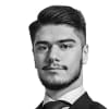 En profilbild av fastighetsmäklare Yousif Gorges