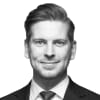 En profilbild av fastighetsmäklare Oskar Berge