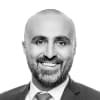 En profilbild av fastighetsmäklare Siyar Hamidanoglu
