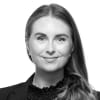 En profilbild av fastighetsmäklare Frida Evstedt
