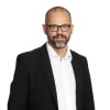 En profilbild av fastighetsmäklare Joakim Soneklint