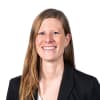 En profilbild av fastighetsmäklare Johanna Högberg