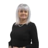 En profilbild av fastighetsmäklare Christel Kulle Mårtensson