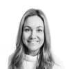 En profilbild av fastighetsmäklare Karin Rolland