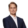 En profilbild av fastighetsmäklare Alexander Danielsson