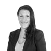 En profilbild av fastighetsmäklare Daniella Georges