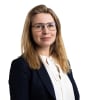 En profilbild av fastighetsmäklare Annika Nittsten
