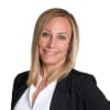 En profilbild av fastighetsmäklare Sandra Tibring