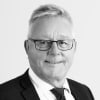 En profilbild av fastighetsmäklare Tommy Lund