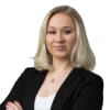 En profilbild av fastighetsmäklare Julia Dragsten