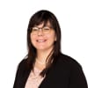 En profilbild av fastighetsmäklare Chatrine Berntsson