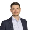 En profilbild av fastighetsmäklare Jimmy Björndahl