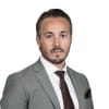 En profilbild av fastighetsmäklare Petter Lindmark