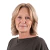 En profilbild av fastighetsmäklare Mia Jonsson