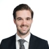 En profilbild av fastighetsmäklare Casper Johansson
