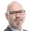En profilbild av fastighetsmäklare Torbjörn Sverker