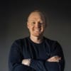 En profilbild av fastighetsmäklare Andreas Persson