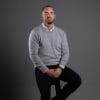 En profilbild av fastighetsmäklare Alexander Karlsson